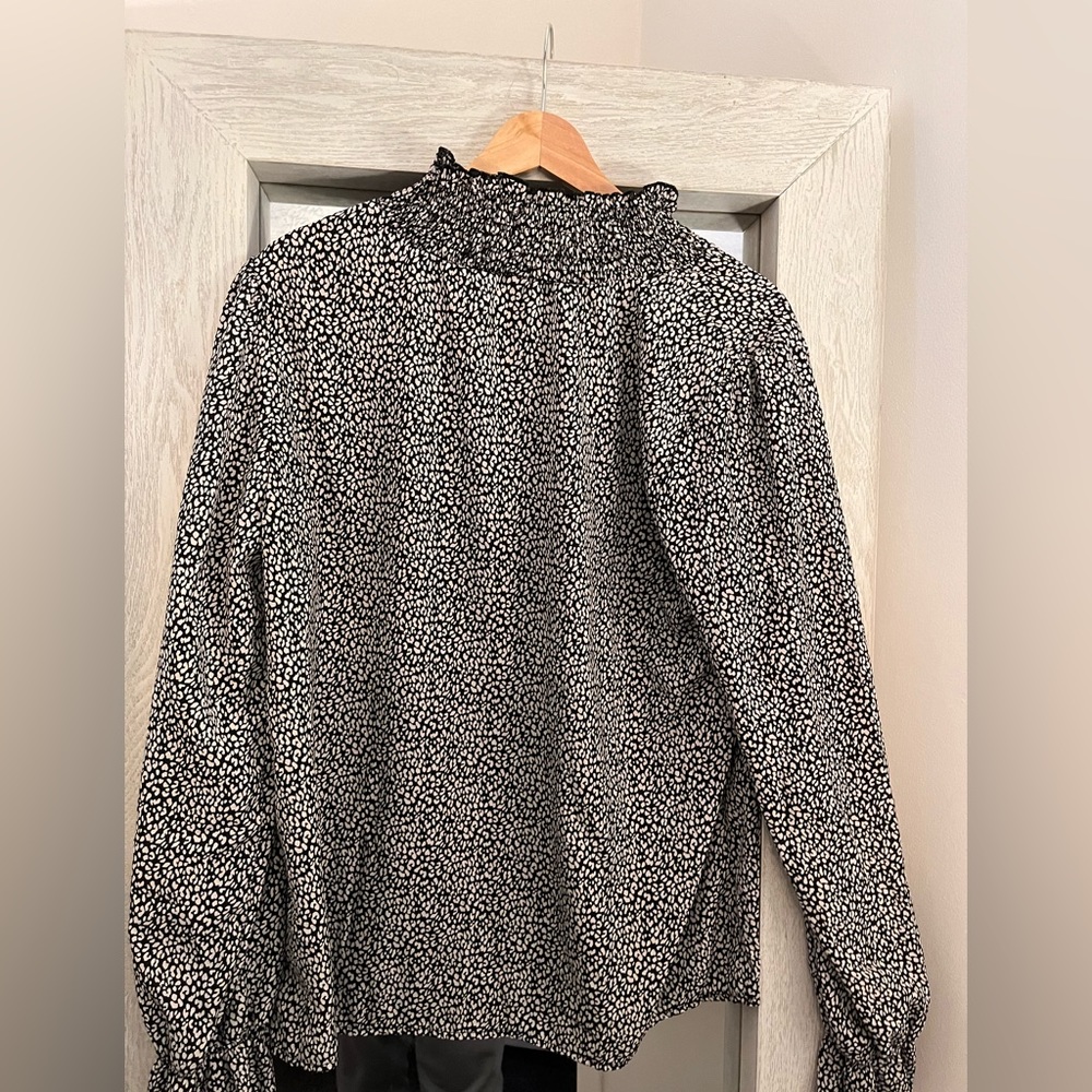 Black turtle neck, cheetah black and white
